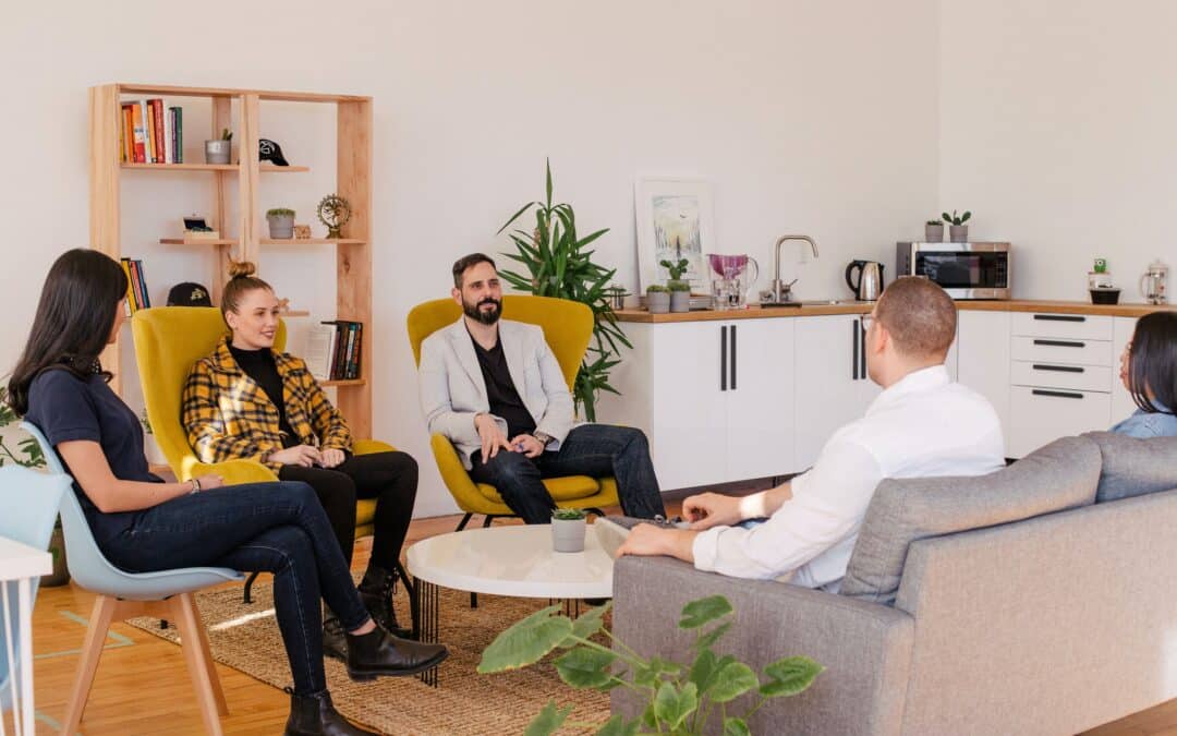 People seated in a meeting room